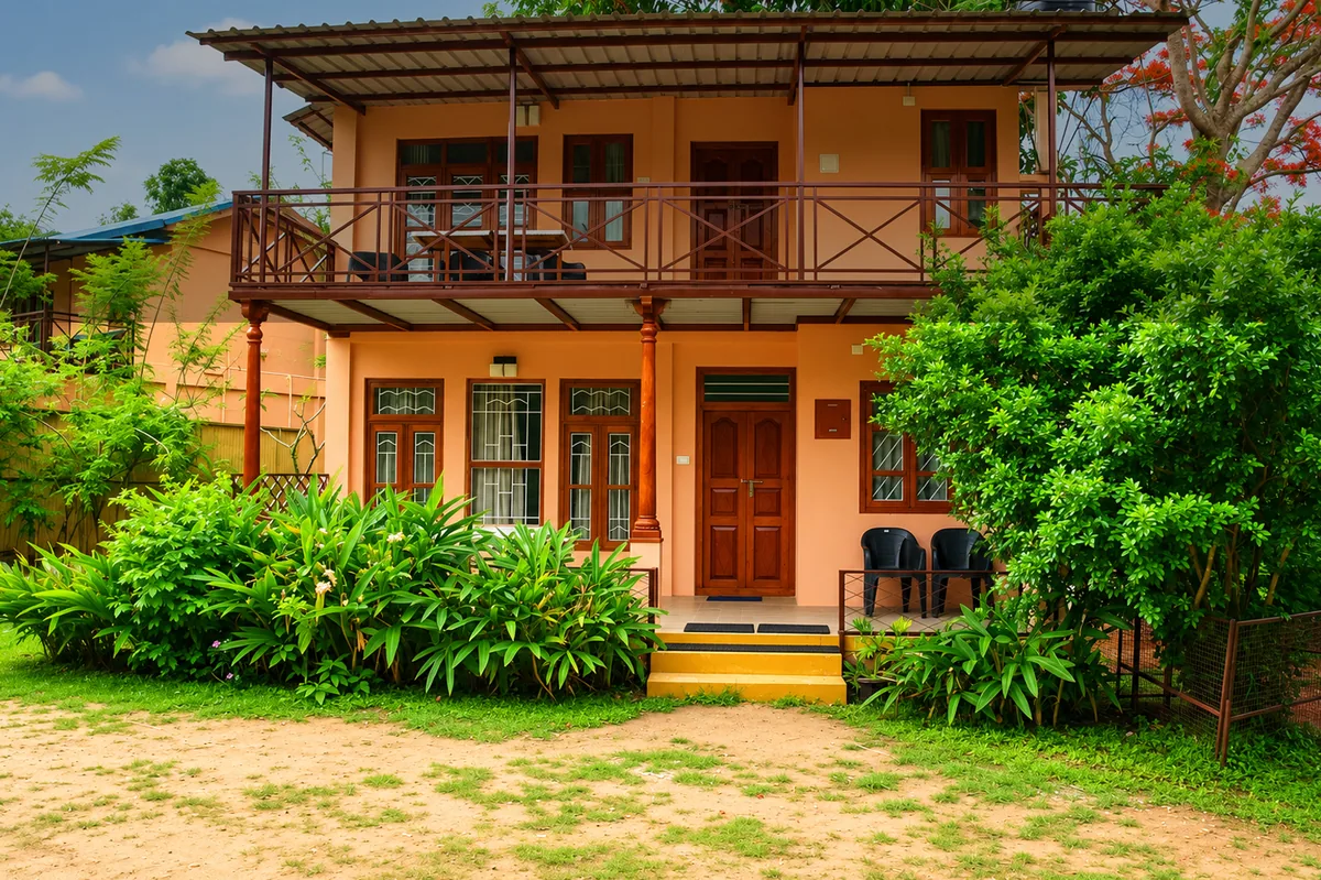 The main building at Aranyasun with its balconies and planted garden